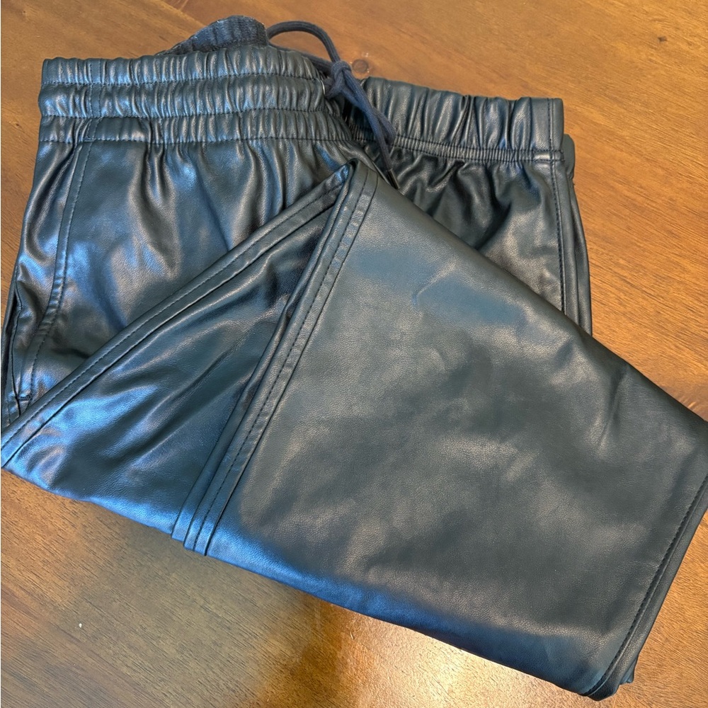 GAP black Medium Long, vegan leather jogger style pants with trouser pockets.